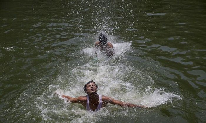 England slows down for `hottest day of the year`